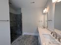 Bathroom featuring a glass enclosed shower with a gray tile surround and a double sink vanity at 259 Luray Way # 443, Rock Hill, SC 29730