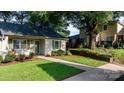 Cute single-story home with lush green lawn and walkway at 1124 St. Charles Ct # 3, Newton, NC 28658