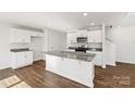 Modern kitchen with white cabinets, granite countertops and stainless steel appliances at 1450 Mammoth Rd, Hickory, NC 28602