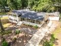 Expansive aerial view of the home with a well-manicured lawn and a long driveway at 1505 Clarendon Pl, Rock Hill, SC 29732