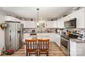 Well-lit kitchen with granite countertops, stainless steel appliances and white cabinetry at 161 Ranson Rd, Lancaster, SC 29720