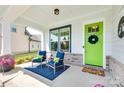 Inviting front porch with stylish seating and a vibrant green door, creating a cozy and welcoming entrance at 264 Auburn View Rd, Rock Hill, SC 29730