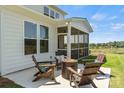 Inviting patio with a fire pit and comfortable seating, perfect for outdoor relaxation at 428 Balboa St, Matthews, NC 28104