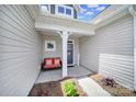Inviting front porch with seating, enhancing curb appeal and providing a welcoming entrance at 440 Shallowford Dr, Rock Hill, SC 29732