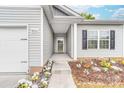 Inviting front entrance with well-maintained landscaping and direct access to the home's spacious interior at 8416 Highgate Dr, Charlotte, NC 28215
