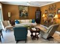 Cozy living room boasts stylish decor, comfortable seating, and ample natural light, perfect for relaxation at 1330 Millview Ln, Matthews, NC 28104