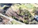 Scenic aerial view of the property located on a golf course at 138 Broken Arrow Rd, Statesville, NC 28677