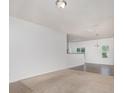 Spacious living room with open layout, new floors, and great flow to the kitchen and dining areas at 1404 Waylon Ave, Gastonia, NC 28054