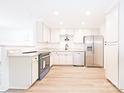 Well-lit kitchen features stainless steel appliances, ample cabinet space, and modern finishes at 1810 Highway 55 W Hwy, Clover, SC 29710