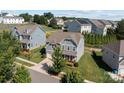 Stunning aerial view of a well-maintained property with lush landscaping and neighborhood at 205 Church St, McAdenville, NC 28101