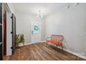 Bright entryway with hardwood floors, modern lighting, and a pop of color from the red bench at 2090 Durand Rd, Fort Mill, SC 29715