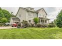 Comfortable home with attached garage and attractive landscaping at 2100 Darian Way, Waxhaw, NC 28173