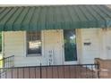 Front porch with 'Welcome Home' sign and the house number: 3220 at 3220 Harmony Hwy, Harmony, NC 28634