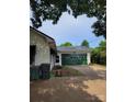 Spacious detached garage with an attached driveway at 3220 Harmony Hwy, Harmony, NC 28634