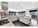 Bright, spacious kitchen with city views, granite countertops and modern stainless steel appliances at 435 S Tryon St, Charlotte, NC 28202