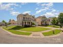 Two-story homes on a cul-de-sac, showcasing well-maintained lawns at 124 Glade Valley Ave, Mooresville, NC 28117
