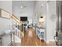 Inviting foyer with hardwood floors, staircase, and stylish decor creating a warm welcome at 2019 Lynmore Dr, Sherrills Ford, NC 28673
