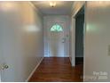 Inviting foyer features hardwood floors and a classic front door at 1116 Fieldstone Rd, Mooresville, NC 28115