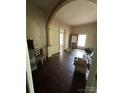 View of a living room featuring hardwood floors and an archway at 118 Hemphill Ave, Chester, SC 29706