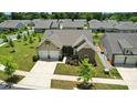 Beautiful aerial view of a suburban home with a well-maintained lawn and a two-car garage at 231 Cotton Ridge Pl, Rock Hill, SC 29730