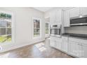 Bright kitchen featuring modern stainless steel appliances and ample natural light at 716 W Graham St, Shelby, NC 28150