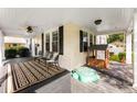 Relaxing covered front porch with seating and ample space for outdoor enjoyment, enhancing the home's appeal at 1210 Jackson Rd, Gastonia, NC 28052
