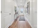 Inviting foyer showcasing wood-look floors and stylish accents for a warm welcome at 1225 Margo Mannor Dr, Fort Mill, SC 29708
