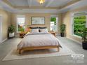 Spacious main bedroom featuring tray ceilings, a neutral color palette, and natural light at 13419 Morgan Lee Ave, Charlotte, NC 28213