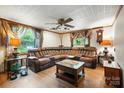 This cozy living room features hardwood floors, a large sectional sofa, and two side tables with lamps at 4412 Dobys Bridge Rd, Fort Mill, SC 29707