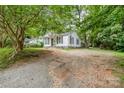Cozy single-story home with a well-maintained yard at 822 Cantwell St, Charlotte, NC 28208