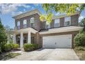 Beautiful brick home with a spacious two-car garage and well-manicured front yard at 15636 Oleander Dr, Charlotte, NC 28278