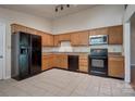 Functional kitchen with stainless steel appliances, granite countertops, and ample cabinet space at 1801 Teddington Dr, Charlotte, NC 28214