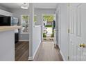 Bright entryway with wood floors, leading into the kitchen at 3414 Broadwick St, Charlotte, NC 28213