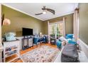 Inviting home office featuring natural light and wood-look floors at 4703 David Cox Rd, Charlotte, NC 28269
