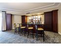 Comfortable community lounge with a full bar, perfect for resident gatherings and socializing at 300 W 5Th St, Charlotte, NC 28202