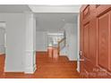 Welcoming foyer with hardwood floors and view of the open-concept living spaces at 516 Cool Creek Dr, Rock Hill, SC 29732