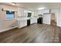 Spacious kitchen with white cabinets and modern appliances at 7812 Old Concord Rd, Salisbury, NC 28146