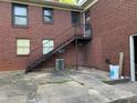 An external view of a house's back with an old metal stairwell at 209 8Th Nw Ave, Hickory, NC 28601