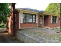 A brick home with stone landscaping at 209 8Th Nw Ave, Hickory, NC 28601