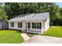 A cozy home with a well-kept lawn and easy access via a convenient driveway at 429 Merry Go Dr, York, SC 29745