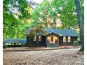 Charming brick home with stone accents and well-maintained landscaping at 143 Uwharrie Ct # 10801081, Mount Gilead, NC 27306