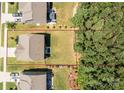 Aerial view showcasing the home's layout, the lot size, surrounding landscape, and the property's location within the neighborhood at 169 Rooster Tail Ln, Troutman, NC 28166