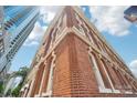 Stunning brick building showcasing beautiful architecture against a clear sky at 229 N Church St # 401, Charlotte, NC 28202