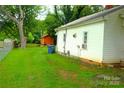 Exterior of home featuring expansive yard, showcasing the property's outdoor space and potential at 238 Deaton St, Statesville, NC 28677