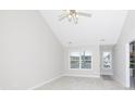 Bright living room featuring a large window and tile flooring at 409 Guiness Pl, Rock Hill, SC 29730