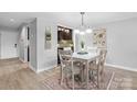 Eat-in dining area with stylish furnishings, lighting fixture, and view of kitchen at 5192 Corbin Ln, Hickory, NC 28601