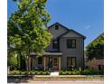Inviting two-story home with covered porch and a well-maintained lawn, perfect for suburban living at 6711 Creft Cir, Lake Park, NC 28079