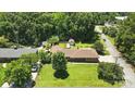 Wide aerial view of single-story home, expansive yard, detached garage, and surrounding neighborhood at 900 Nance St, Kannapolis, NC 28083