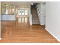 Bright living room featuring hardwood floors and an open floor plan at 14307 Hartwell Farm Dr, Charlotte, NC 28278