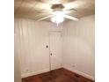 Cozy bedroom featuring hardwood floors, wainscoting and neutral paint at 1617 Madison St, Rock Hill, SC 29732
